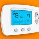 Digital thermostat displaying 73°F, 71°F settings, featuring buttons, provided by Easco HVAC services.